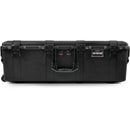 Pelican, 1726 Air, Straight front view of a closed black hard case featuring push-button latches, a fold-down center handle, and dual pressure equalization valves.