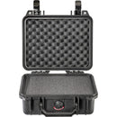 An overhead shot of the Pelican 1200 Case fully open. The lid is lined with grey "egg-crate" convoluted foam, while the base contains a solid, customizable foam insert for cushioning equipment.
